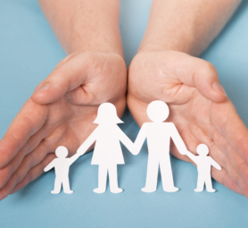 front-view-person-holding-hands-cute-paper-family